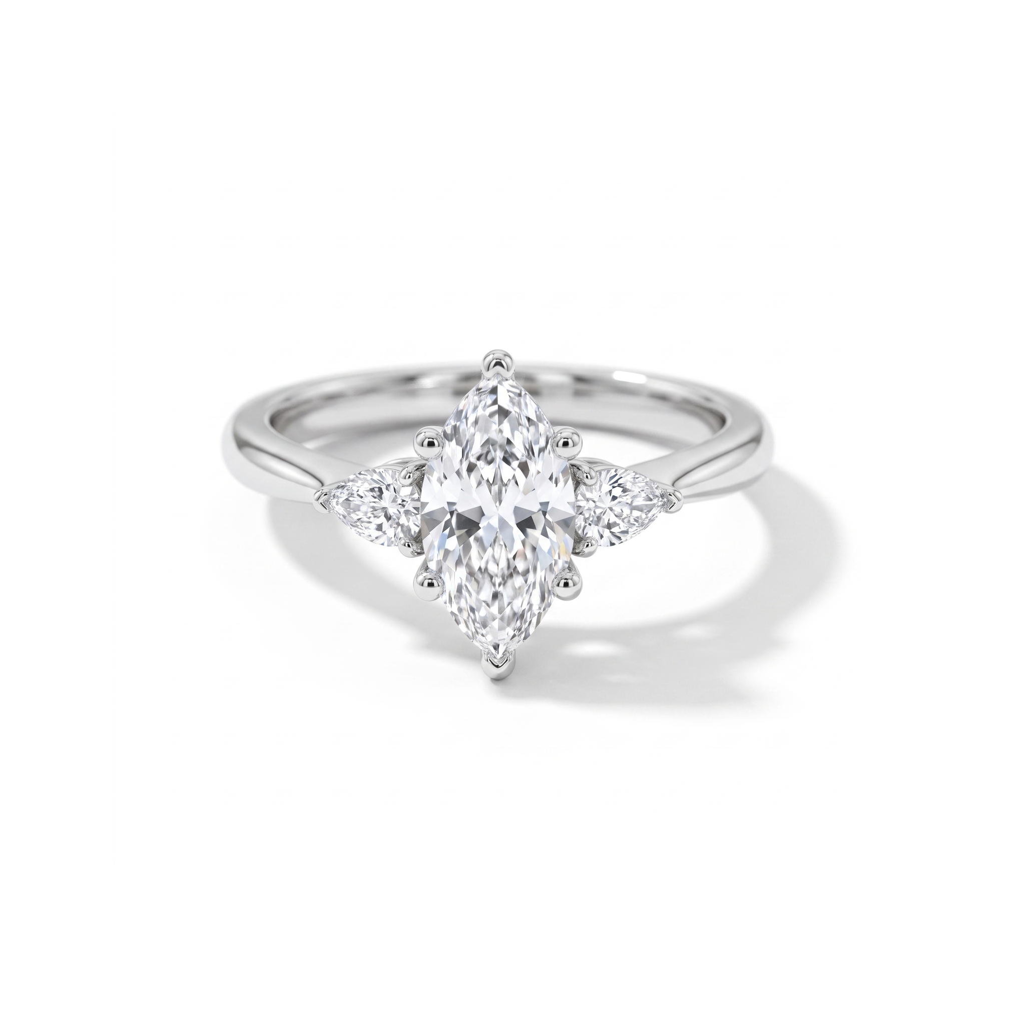Marquise engagement ring with pear accents, front view, white gold shown