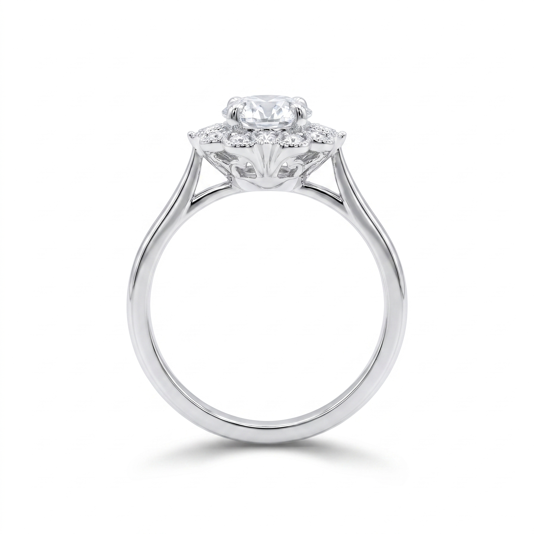 Vintage floral halo engagement ring, front view, white gold shown