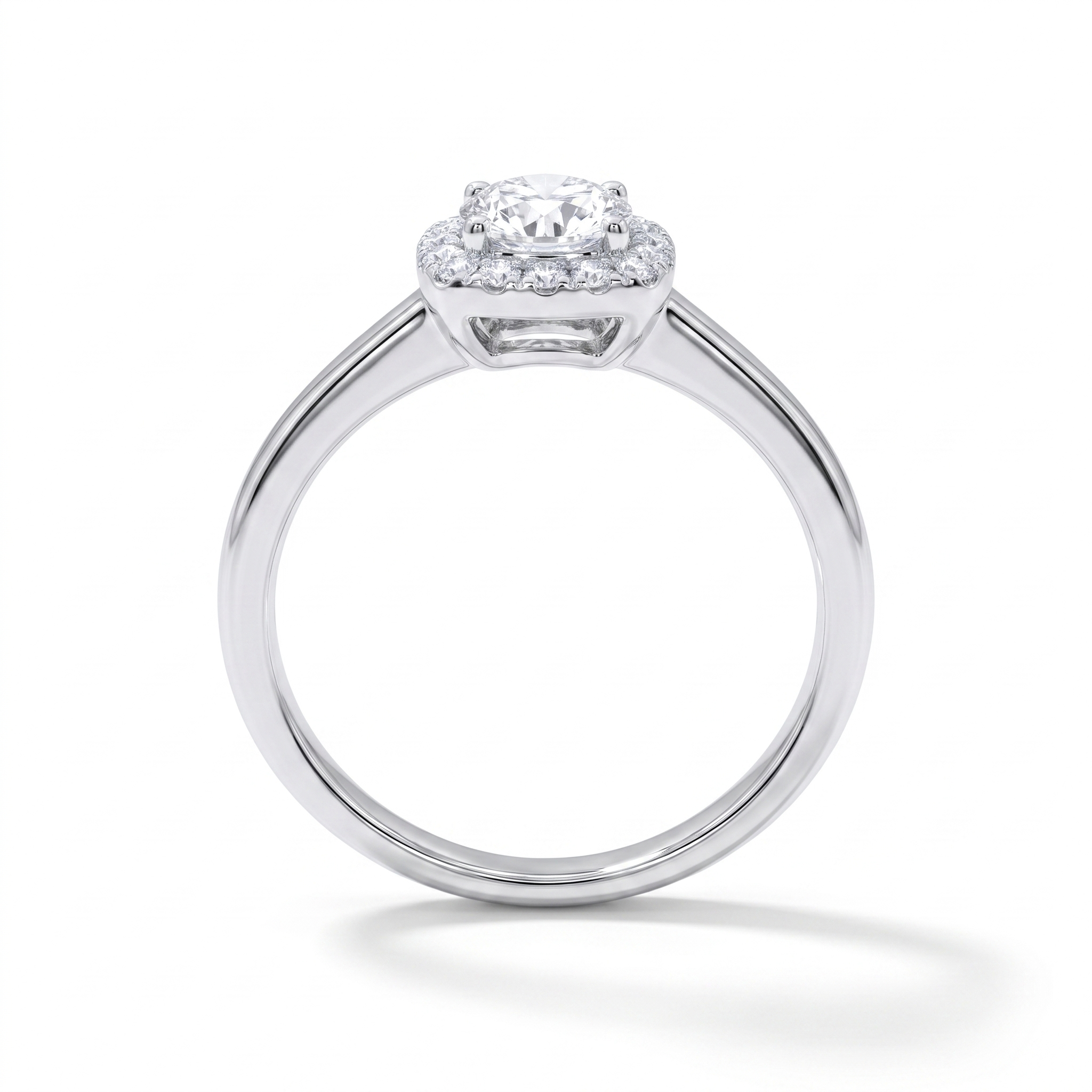 Round cushion halo engagement ring, front view, white gold shown